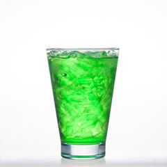 Green fruit flavor soft drinks whit soda water isolated