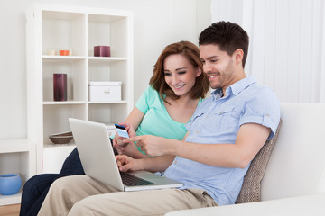 Young couple shopping online