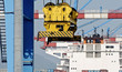 dockside crane with cargo ship