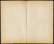 Two blank vintage paperback book pages isolated on black.