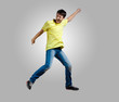 © Sergey Nivens - Young man dancing and jumping
