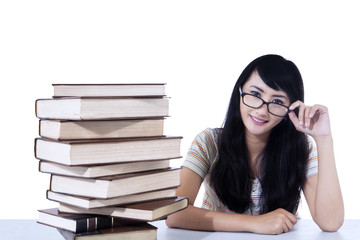 Wall Mural - Beautiful female nerd student and books - isolated