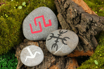 Wall Mural - Fortune telling  with symbols on stone close up