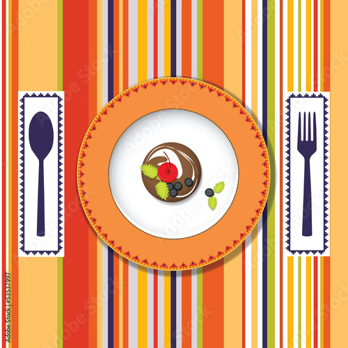Nowoczesny obraz na płótnie A plate with a cake with a spoon and fork