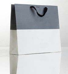 Grey and white shopping bag.