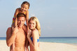 © Monkey Business - Portrait Of Family On Tropical Beach Holiday