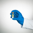 radioactive isotope sample held by someone