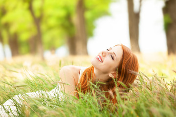 Wall Mural - Redhead girl at outdoor