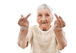 very old woman showing her middle finger