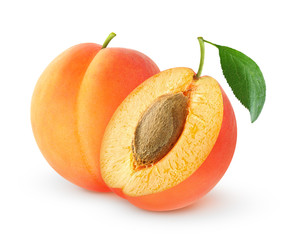 Fototapete - Isolated apricots. One whole fresh apricot fruit with leaf and a half isolated on white background