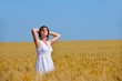 © .shock - young woman in wheat field at summer