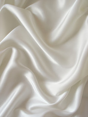 Draped white silk background