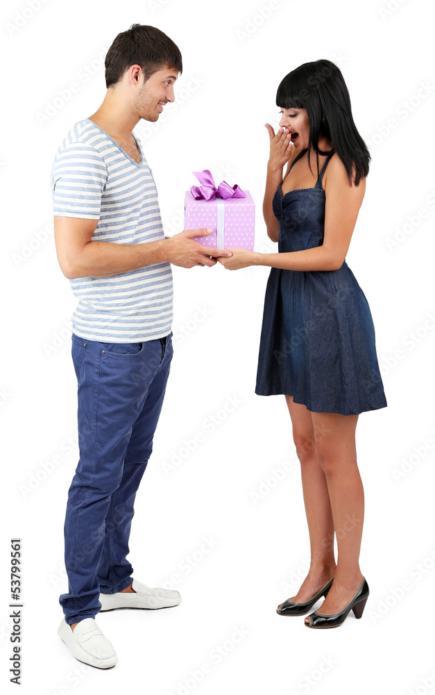 Beautiful loving couple with gift isolated on white