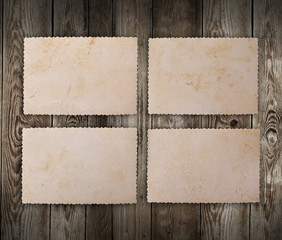 Wall Mural - Blank photo frame on wooden background