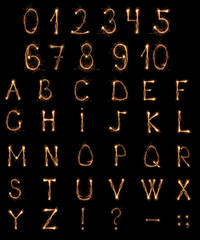 Canvas Print - Alphabet and Numbers sparklers on black background