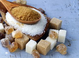 Fototapeta  - Various kinds of sugar, brown, white and refined sugar