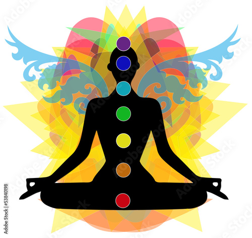 Fotografia sagoma in posizione yoga e punti chakra