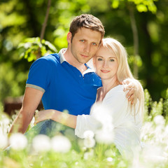 Young happy couple in the park