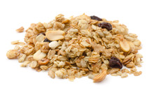 Pile Of Granola Cereal With Raisins And Nuts