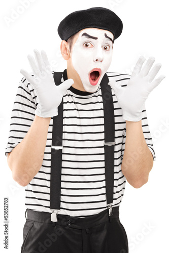 Fototapeta na wymiar Male mime artist gesturing with his hands excitement