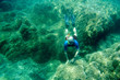 Free diver on the bottom of Tyrhenian sea. Elba island, Italy.