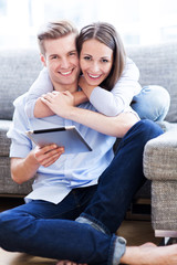 Poster - Couple using digital tablet