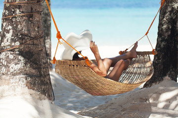 Wall Mural - Young beautiful woman on the beach