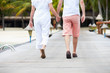 © Monkey Business - Detail Of Senior Couple Walking On Wooden Jetty