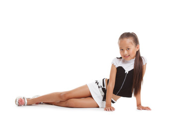 image of smiling little brunette posing in studio