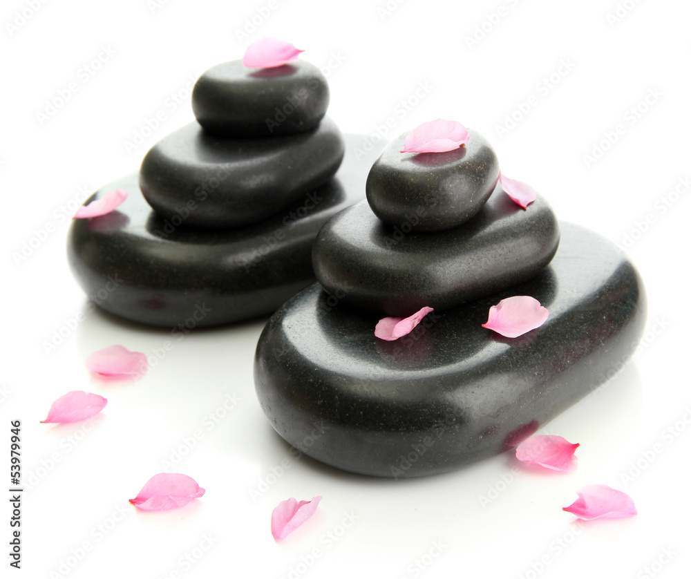 Spa stones and petals isolated on white