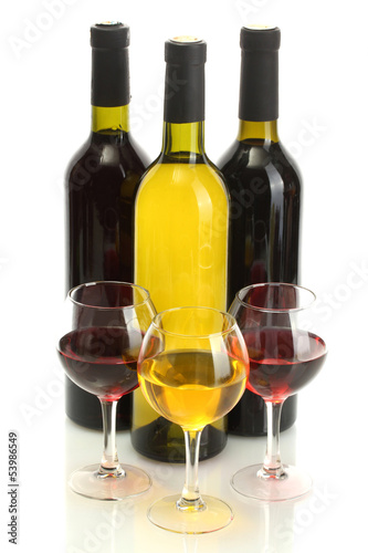 Nowoczesny obraz na płótnie bottles and glasses of wine isolated on white