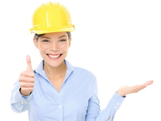 Engineer woman showing thumbs up and product