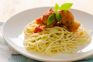 Wall Mural - plate of spaghetti with meatballs in tomato marinara sauce and i