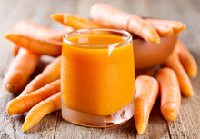 Glass Of Carrot Juice With Fresh Carrots