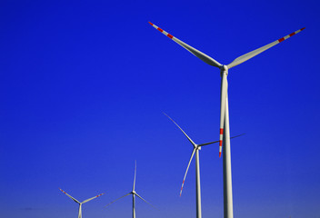 Wind turbines farm. Windmill