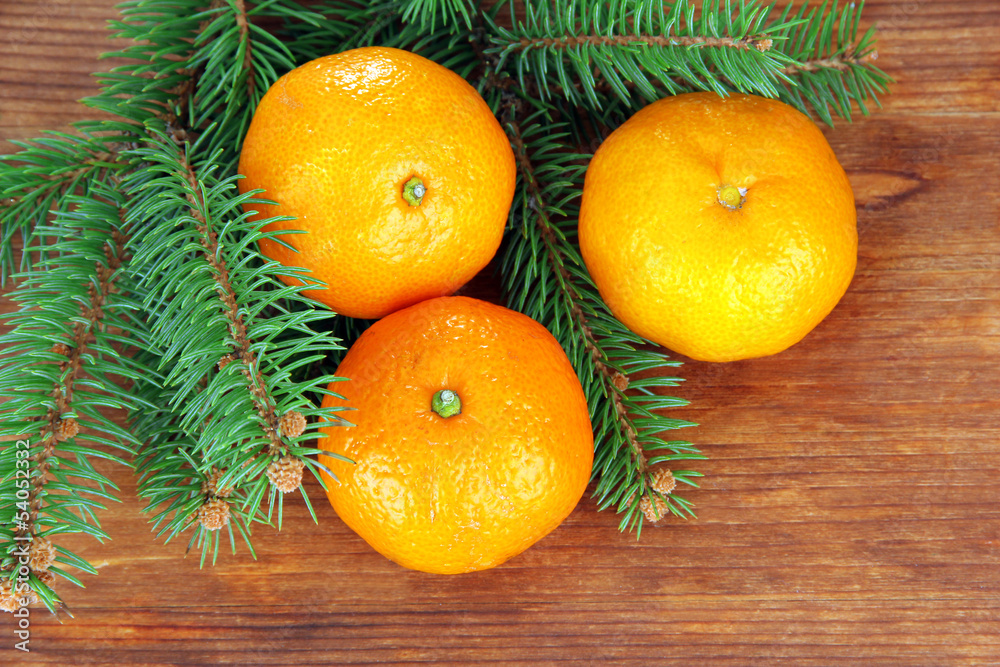 Tasty mandarines on wooden background