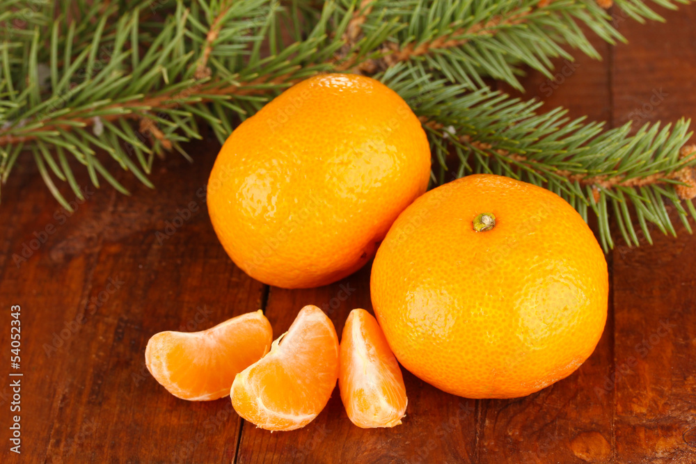 Tasty mandarines  on wooden background