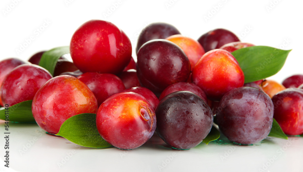 Ripe plums isolated on white