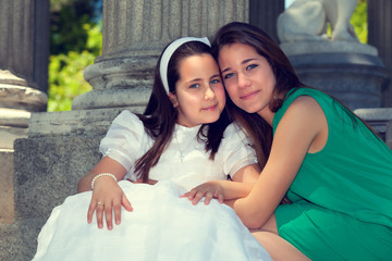 Two sisters in the First Communion Day