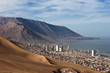 Iquique behind a huge dune, northern Chile