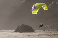 Paraglider Landing On Beach