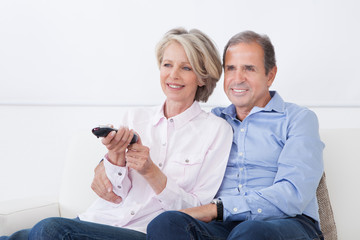 Mature Couple Watching Television