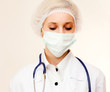 © lenets_tan - Closeup portrait of a female nurse or a doctor looking dowт