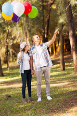 Wall Mural - cute teen couple in forest