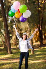 Wall Mural - happy teen girl with arms outstretched