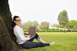 © .shock - woman with laptop in park