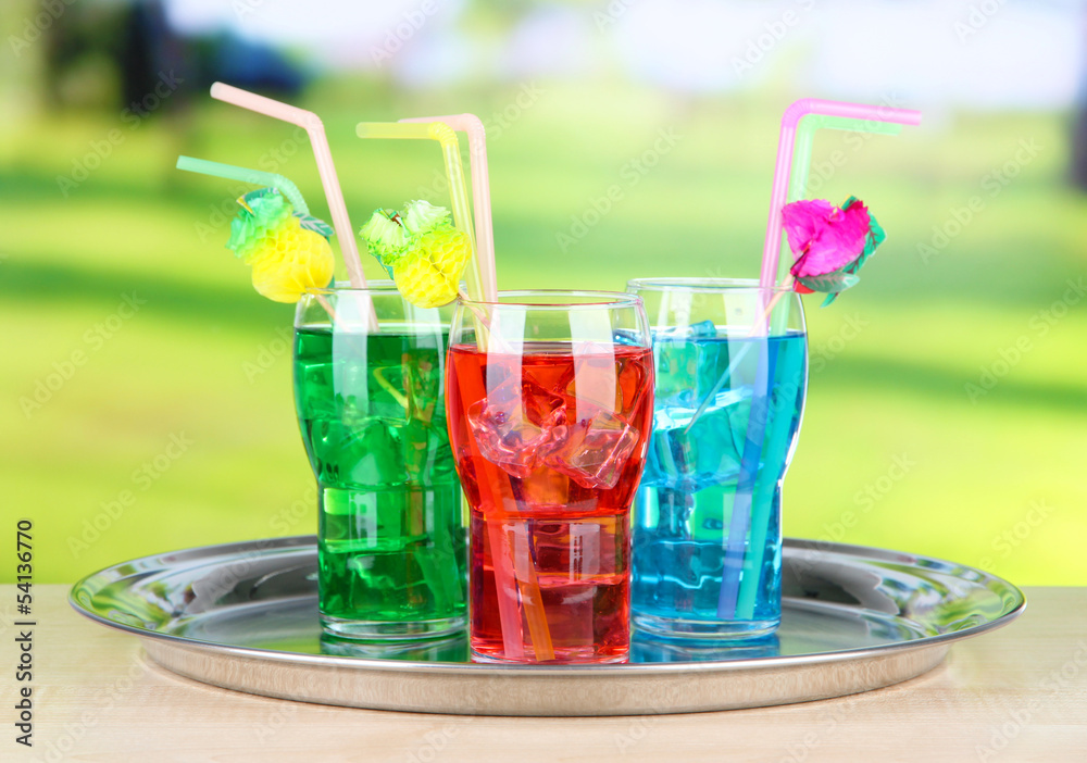 Different cocktails on bright background