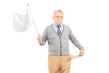 Sticker - Sad senior man waving a white flag and showing his empty pocket