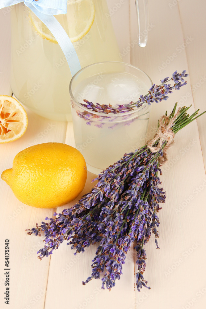 Lavender lemonade, on white wooden background