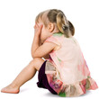 © karelnoppe - Upset kid hiding face with hands.